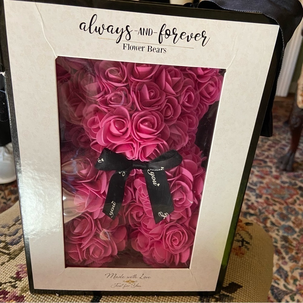 Always & Forever Bear in bright pink with black tie. New in the box. It’s a girl